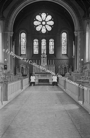 COLLEGE CHAPEL INTERIOR WITH STUDENTS